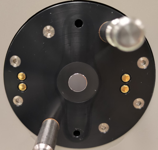 Figure 4 (a). Polished mirrors in different dew point hygrometers a